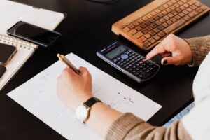 woman using a calculator for computation